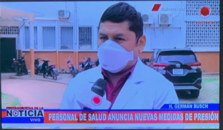 Nursing graduate Ernesto Arinez speaks to a national news outlet
about the pandemic at German Busch Hospital in May 2020.